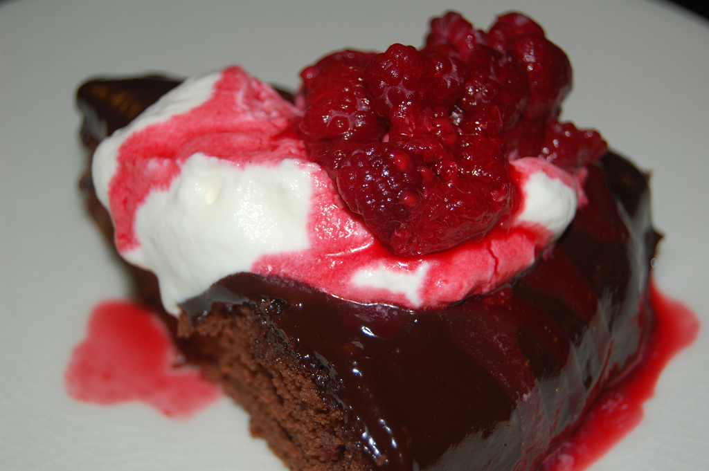 chocolate cake with raspberries, whipped cream, and ganache!