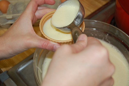 pouring into the ramekins